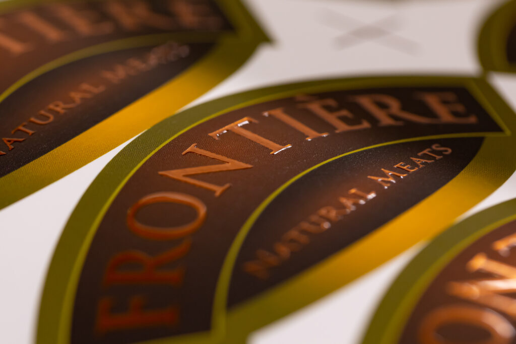 Sticker Mountain custom label printing with soft touch copper foil raised spot UV with white bopp